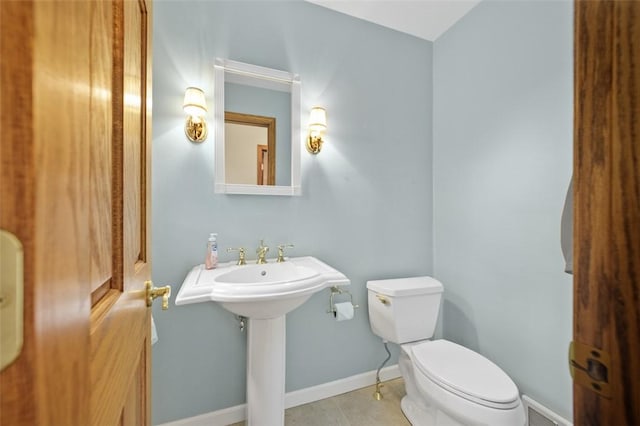 126 Elm Dr, Level Green, PA 15085 - bathroom featuring toilet and tile patterned flooring
