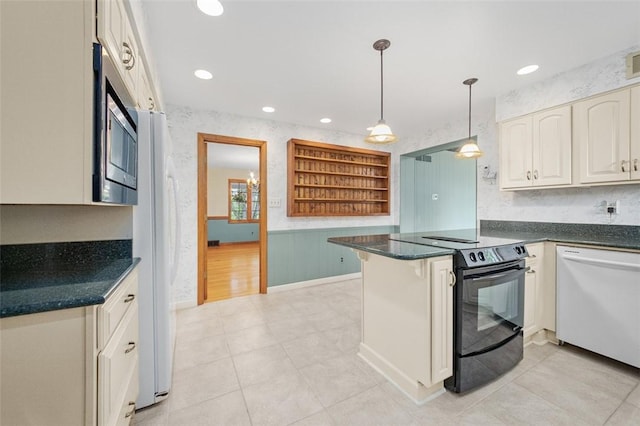 126 Elm Dr, Level Green, PA 15085 - kitchen with dishwasher, black electric range, stainless steel microwave, dark countertops, and recessed lighting