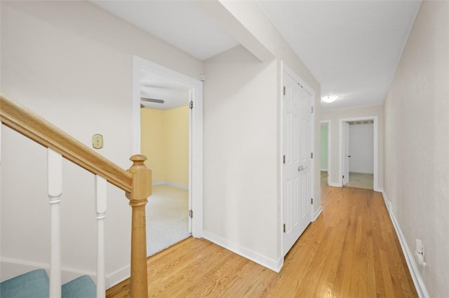 126 Elm Dr, Level Green, PA 15085 - hallway with wood finished floors and stairs