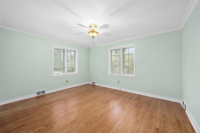 126 Elm Dr, Level Green, PA 15085 - spare room featuring ceiling fan, crown molding, and wood finished floors