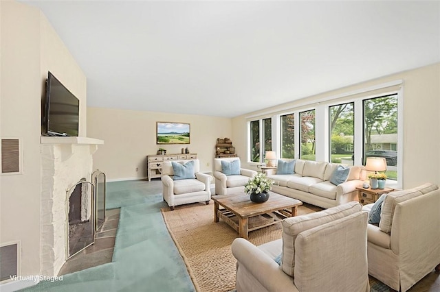 126 Elm Dr, Level Green, PA 15085 - living area featuring a fireplace and finished concrete flooring