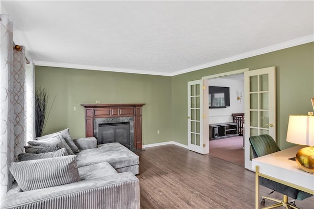 406 Pin Oak Ct, Coraopolis, PA 15108 - living area featuring french doors, dark wood finished floors, a high end fireplace, crown molding, and a desk