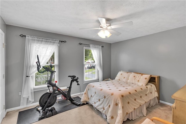 406 Pin Oak Ct, Coraopolis, PA 15108 - bedroom featuring light carpet, a ceiling fan, and a textured ceiling