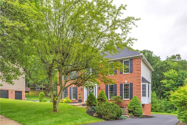 406 Pin Oak Ct, Coraopolis, PA 15108 - colonial home with a front lawn and brick siding