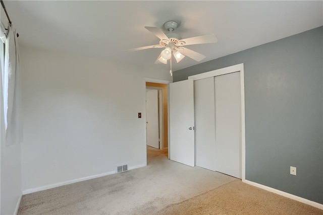 156 Dwellington Dr, Middlesex Twp, PA 16059 - unfurnished bedroom featuring light colored carpet, a closet, and ceiling fan