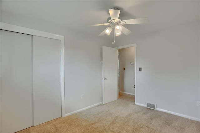 156 Dwellington Dr, Middlesex Twp, PA 16059 - unfurnished bedroom with light carpet, a closet, and ceiling fan