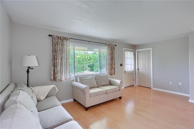 156 Dwellington Dr, Middlesex Twp, PA 16059 - living room featuring light wood finished floors and baseboards