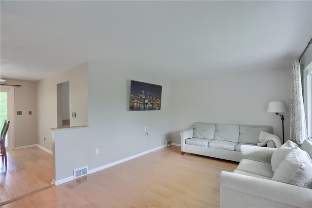 156 Dwellington Dr, Middlesex Twp, PA 16059 - living room with light wood-style floors and baseboards