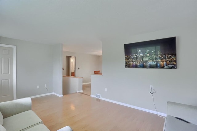 156 Dwellington Dr, Middlesex Twp, PA 16059 - living room featuring wood finished floors and baseboards