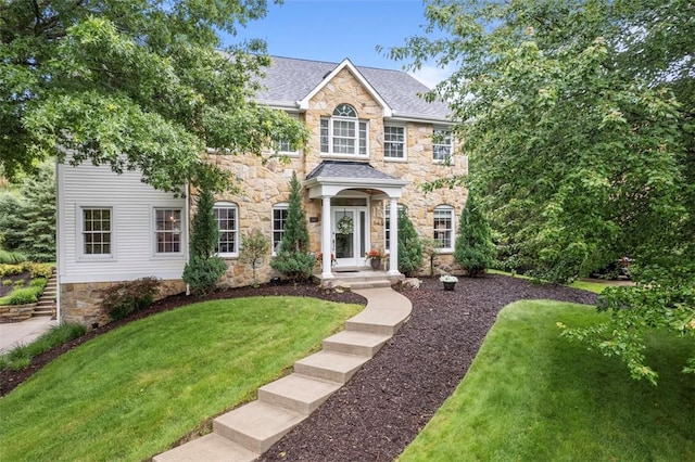 140 Golfview Dr, Adams Twp, PA 15044 - view of front of property with stone siding, a front lawn, and a shingled roof