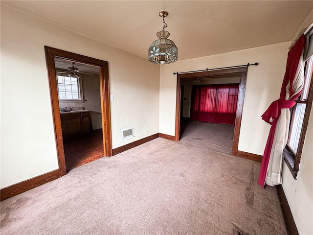 2406 Banker St, Mckeesport, PA 15132 - carpeted spare room featuring baseboards and a sink