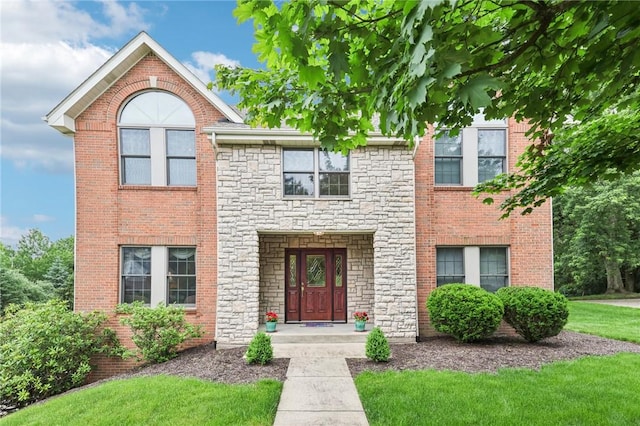 1386 Royal Oak Dr, Marshall, PA 15090 - view of front of home with stone siding, a front lawn, and brick siding