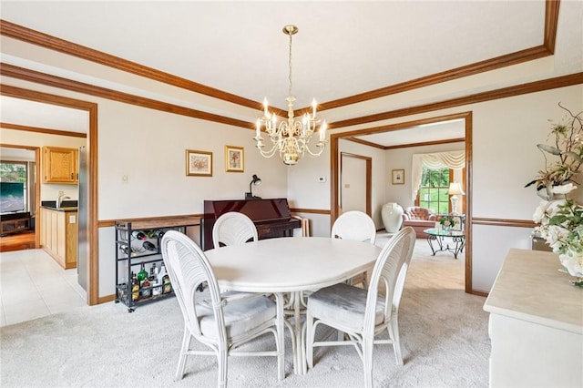 1386 Royal Oak Dr, Marshall, PA 15090 - dining area with light carpet, a chandelier, crown molding, and a raised ceiling