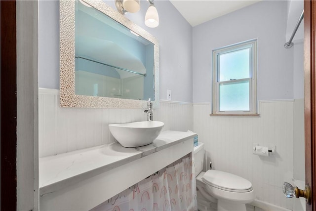 129 Temona Dr, Pleasant Hills, PA 15236 - bathroom with wainscoting, a shower, and vanity