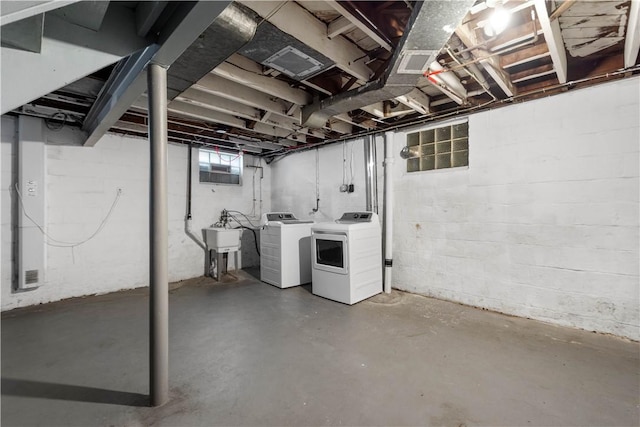 129 Temona Dr, Pleasant Hills, PA 15236 - below grade area with separate washer and dryer and a sink