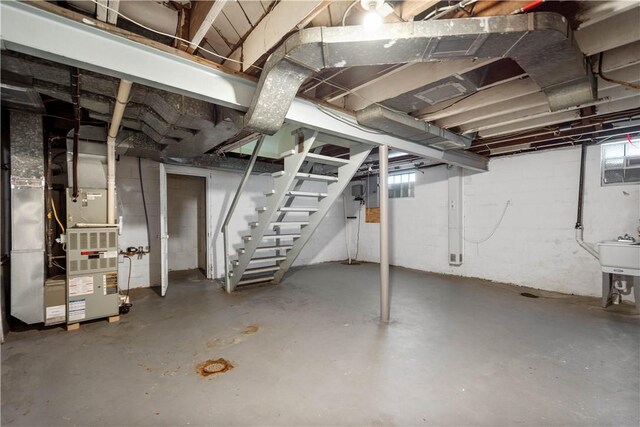 129 Temona Dr, Pleasant Hills, PA 15236 - basement featuring stairway and heating unit