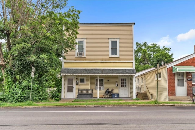 957-959 5th Ave, East Mckeesport, PA 15035 - view of front of house with a porch and cooling unit