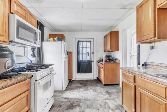 957-959 5th Ave, East Mckeesport, PA 15035 - kitchen featuring white appliances and a paneled ceiling
