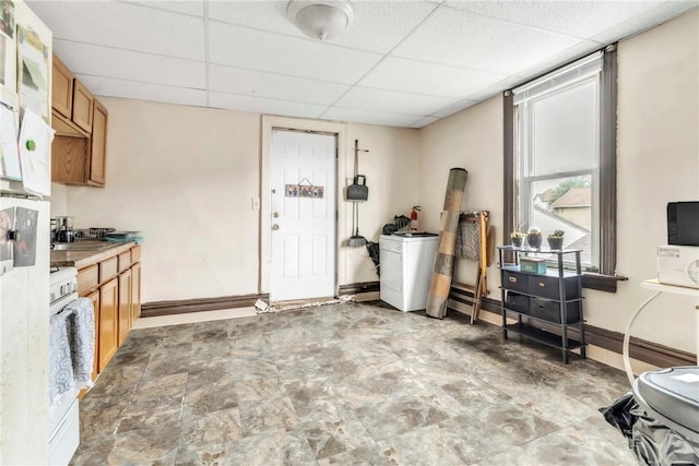 957-959 5th Ave, East Mckeesport, PA 15035 - kitchen featuring a drop ceiling, brown cabinets, and stone finish flooring