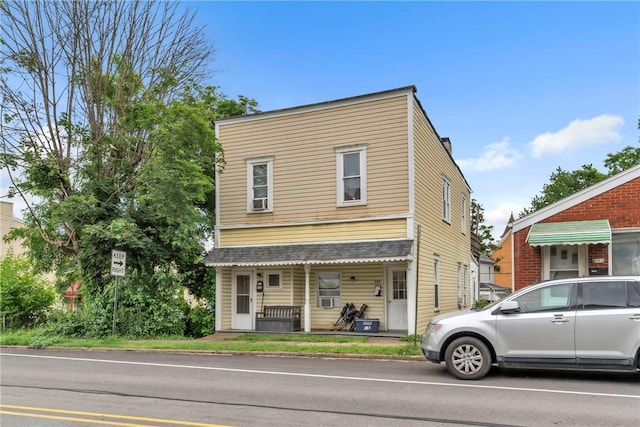 957-959 5th Ave, East Mckeesport, PA 15035 - view of front of house featuring a porch and a chimney