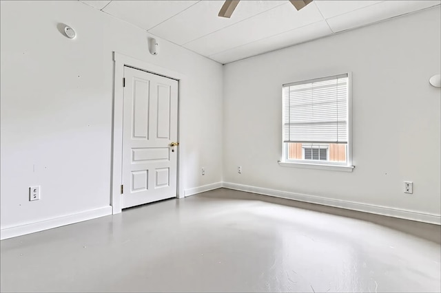957-959 5th Ave, East Mckeesport, PA 15035 - spare room with finished concrete flooring and baseboards