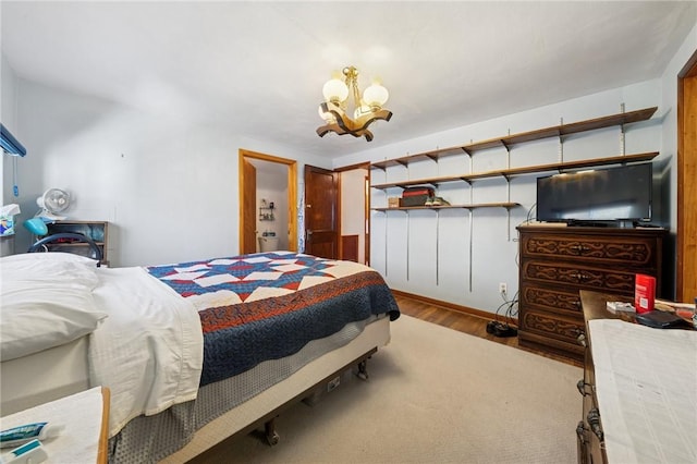 201 Hickory Way, Oakmont, PA 15139 - bedroom with a chandelier and wood finished floors
