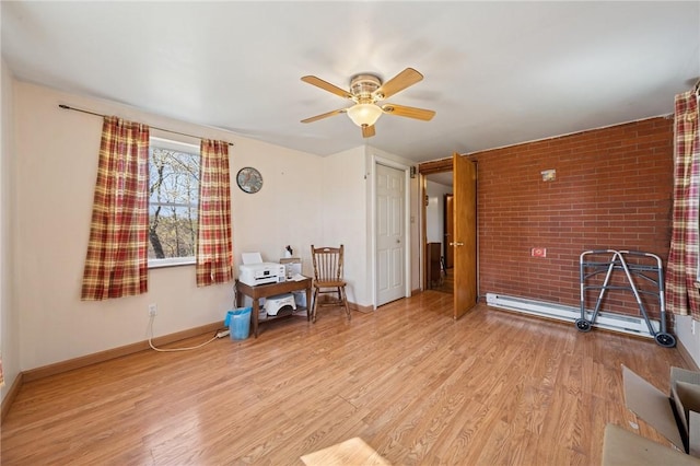 201 Hickory Way, Oakmont, PA 15139 - living area with ceiling fan, light wood finished floors, brick wall, and baseboard heating
