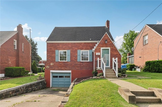 221 Miller Ave, Duquesne, PA 15110 - view of front facade featuring driveway, brick siding, a garage, and a front yard