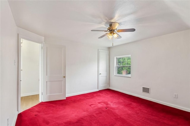 221 Miller Ave, Duquesne, PA 15110 - unfurnished bedroom with carpet floors and ceiling fan