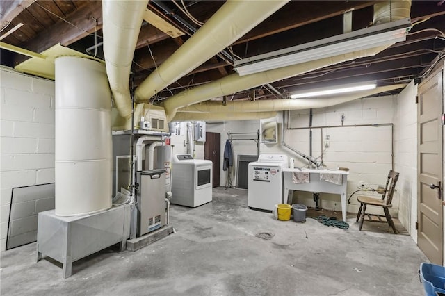 221 Miller Ave, Duquesne, PA 15110 - unfinished basement with washer / clothes dryer and concrete block wall