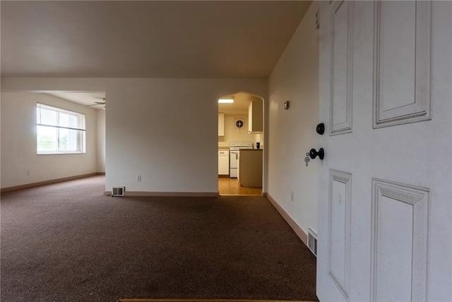 2341 Candace St, Beechview, PA 15216 - spare room with arched walkways, light colored carpet, and a ceiling fan