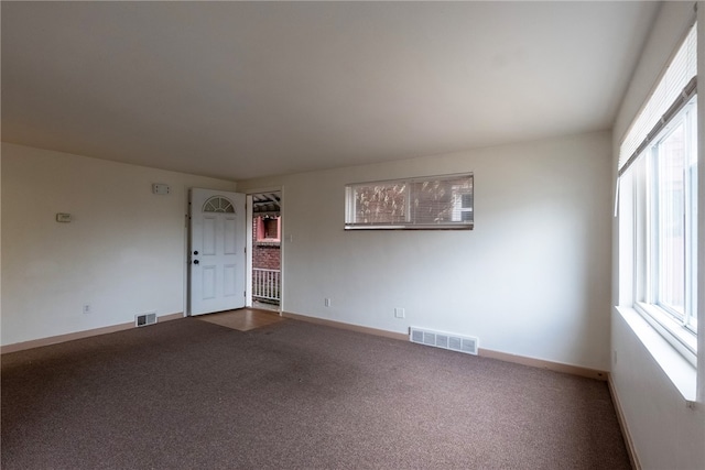 2341 Candace St, Beechview, PA 15216 - unfurnished room featuring plenty of natural light and dark colored carpet