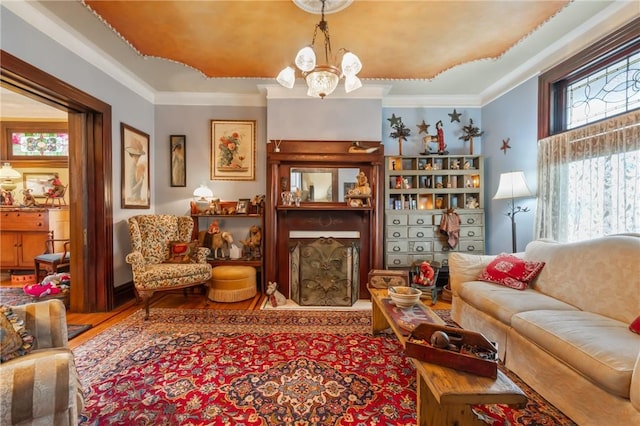 125 Richey Ave, Observatory Hill, PA 15214 - sitting room with a chandelier, wood finished floors, crown molding, and a raised ceiling