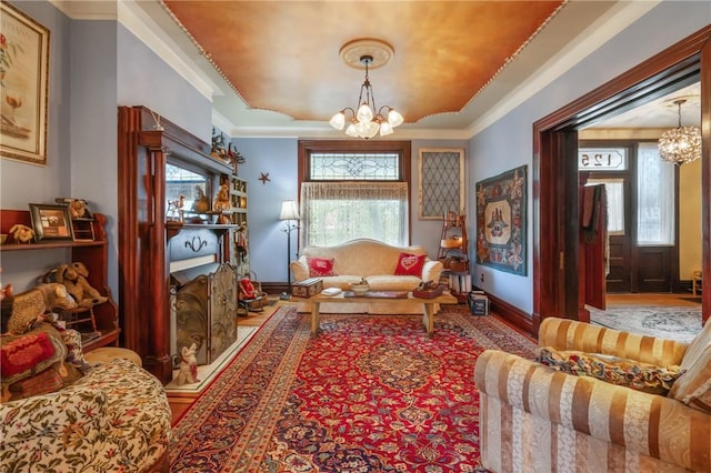 125 Richey Ave, Observatory Hill, PA 15214 - living area featuring a chandelier, wood finished floors, a tray ceiling, and crown molding