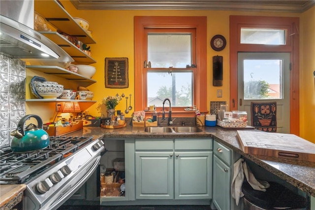 125 Richey Ave, Observatory Hill, PA 15214 - kitchen featuring stainless steel gas range, extractor fan, open shelves, crown molding, and dark countertops