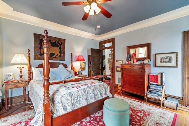 125 Richey Ave, Observatory Hill, PA 15214 - bedroom with wood finished floors, a ceiling fan, and a raised ceiling