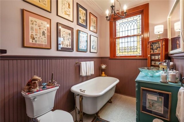 125 Richey Ave, Observatory Hill, PA 15214 - bathroom featuring wainscoting, a soaking tub, a chandelier, and vanity