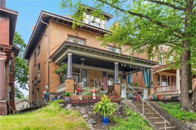 125 Richey Ave, Observatory Hill, PA 15214 - view of front facade featuring a porch and brick siding