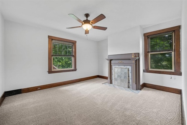 3123 Willett Rd, Brentwood, PA 15227 - unfurnished living room featuring carpet flooring, a ceiling fan, and a tile fireplace