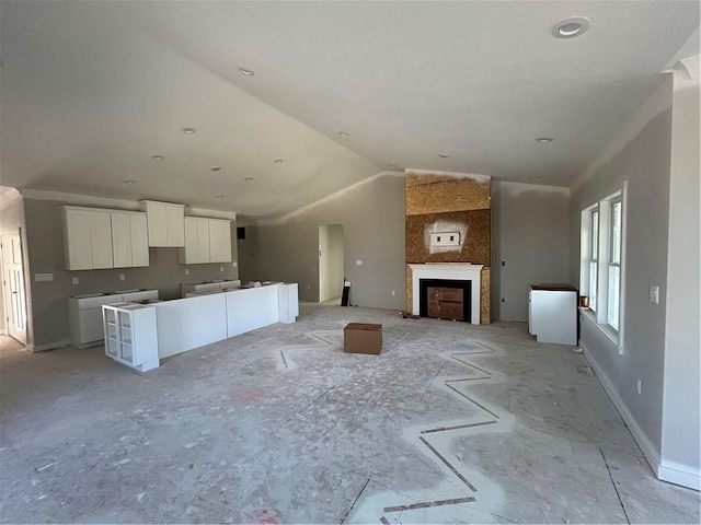 232 Lola Ct, Robinson Twp Nwa, PA 15136 - unfurnished living room featuring vaulted ceiling and a fireplace