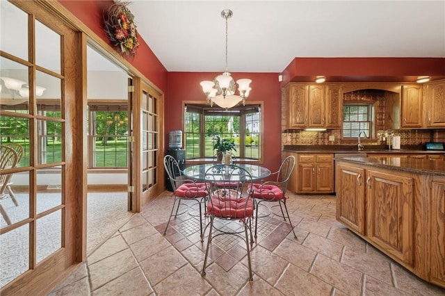 101 Blackthorn Dr, Penn Twp But, PA 16002 - dining room with a chandelier and stone tile flooring