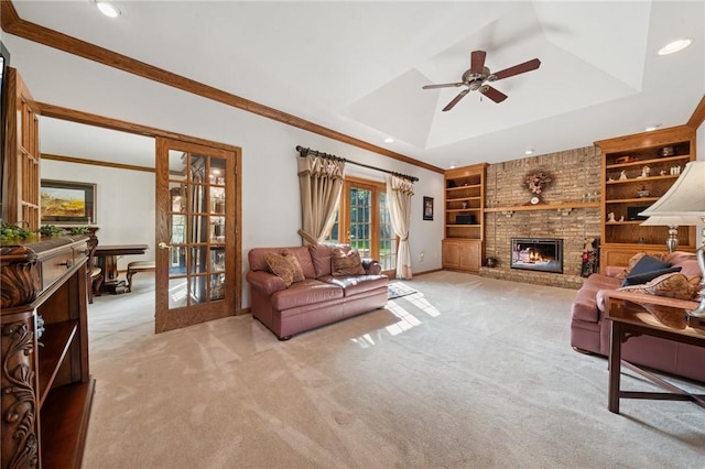 101 Blackthorn Dr, Penn Twp But, PA 16002 - living area with french doors, light carpet, built in shelves, recessed lighting, and ceiling fan