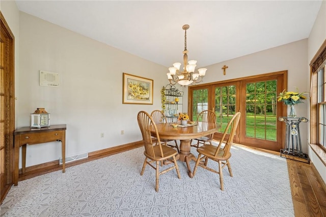 101 Blackthorn Dr, Penn Twp But, PA 16002 - dining space with a chandelier and wood finished floors