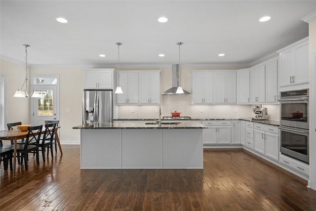 406 Oak Ridge Ct, Pine Twp Nal, PA 16046 - kitchen with stainless steel appliances, wall chimney exhaust hood, crown molding, white cabinets, and backsplash
