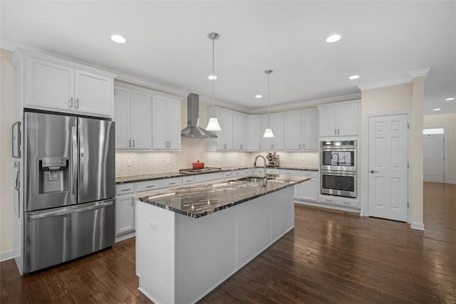 406 Oak Ridge Ct, Pine Twp Nal, PA 16046 - kitchen with appliances with stainless steel finishes, wall chimney range hood, white cabinetry, decorative backsplash, and recessed lighting