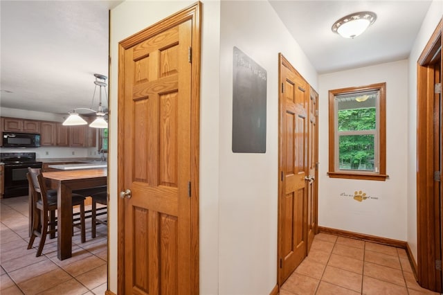 29 Cherry Tree Ln, Mercer Boro Mer, PA 16137 - hallway with light tile patterned floors and baseboards