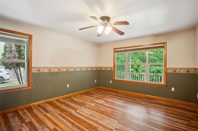29 Cherry Tree Ln, Mercer Boro Mer, PA 16137 - unfurnished room featuring plenty of natural light, wood finished floors, and ceiling fan