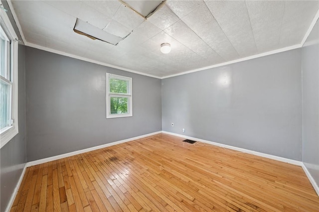 320 Cline St, E Pittsburgh, PA 15112 - spare room with hardwood / wood-style flooring and ornamental molding