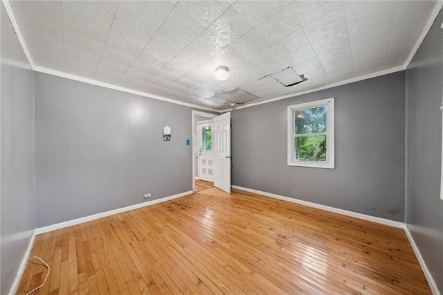320 Cline St, E Pittsburgh, PA 15112 - spare room featuring healthy amount of natural light, ornamental molding, and hardwood / wood-style floors