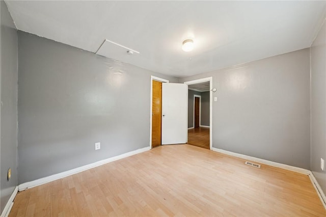 320 Cline St, E Pittsburgh, PA 15112 - empty room featuring baseboards and wood finished floors